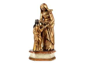 Detailabbildung:  Schnitzfigurengruppe der Heiligen Anna bei der Lehrunterweisung der jugendlichen Maria