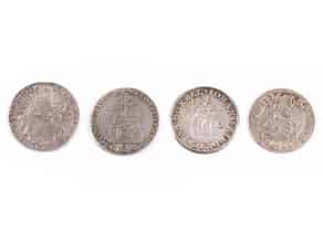 Detailabbildung:  Vier verschiedene Münzen