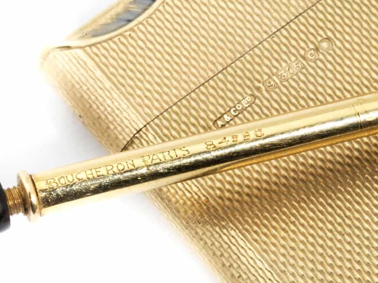 Detailabbildung: Goldene Zigarettenspitze von Boucheron und Feuerzeug