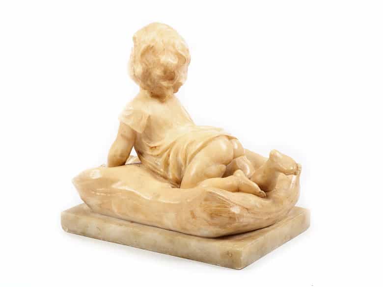 Detailabbildung: Kleines Kind auf Kissen