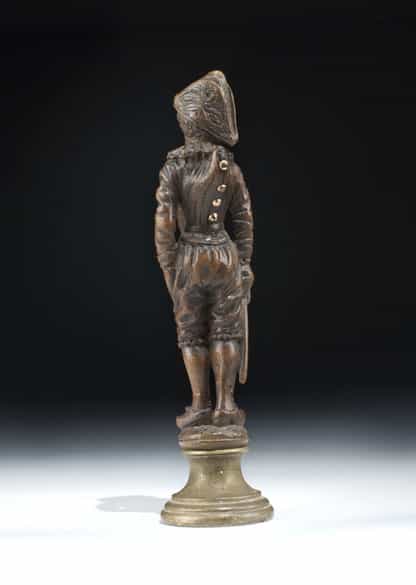 Detailabbildung: Kleine Schnitzfigur eines Hofnarren