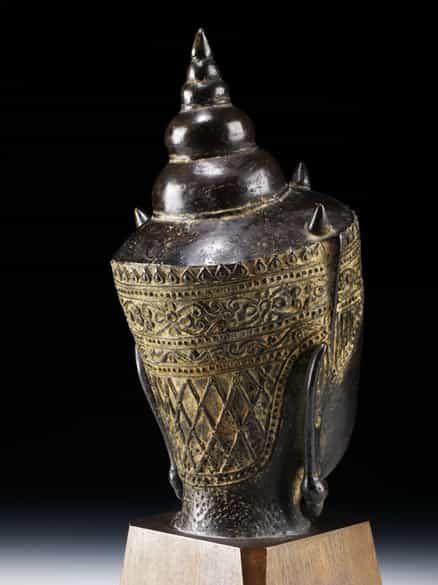 Detailabbildung: Buddha-Kopf in Bronze