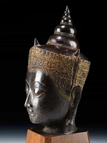 Detailabbildung: Buddha-Kopf in Bronze