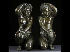  Paar kniende Bronzeputten