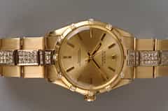 ROLEX OYSTER-PERPETUEL DAY-DATE HERRENARMBANDUHR 18 KT ROTGOLD 