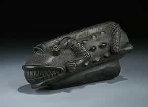 Pfeifenkopf aus schwarz poliertem Ton in Form eines Krokodils