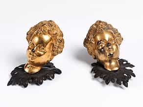 Zwei jugendliche Köpfe in vergoldeter Bronze