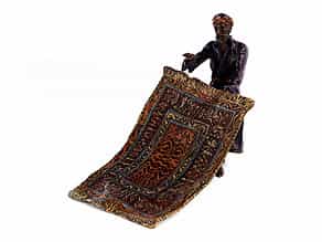 Bronzefigur eines arabischen Teppichhändlers