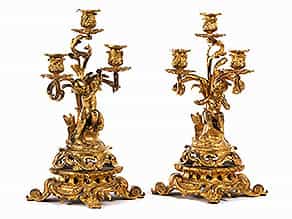 Paar figürlich gestaltete Girandolen in Bronze und Vergoldung