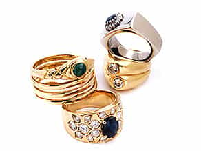  Vier Ringe mit Brillanten und Farbsteinen