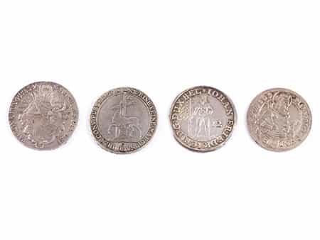Vier verschiedene Münzen