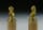Detailabbildung: Paar Miniaturbüsten in feuervergoldeter Bronze auf Steinsockeln